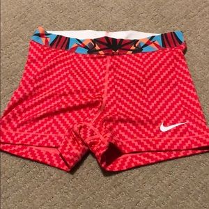 Coral Nike pro shorts